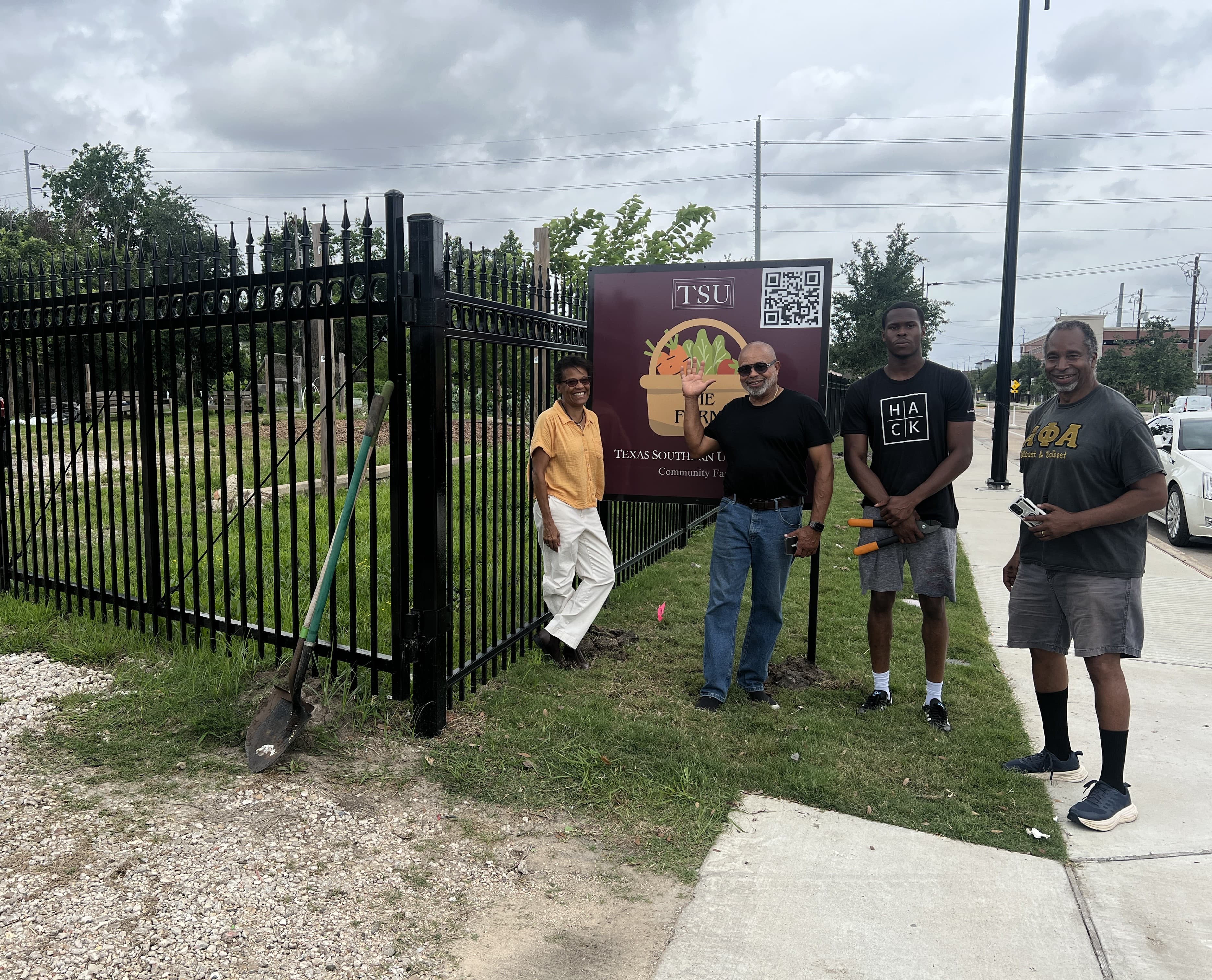 Farm team at the entrance gate