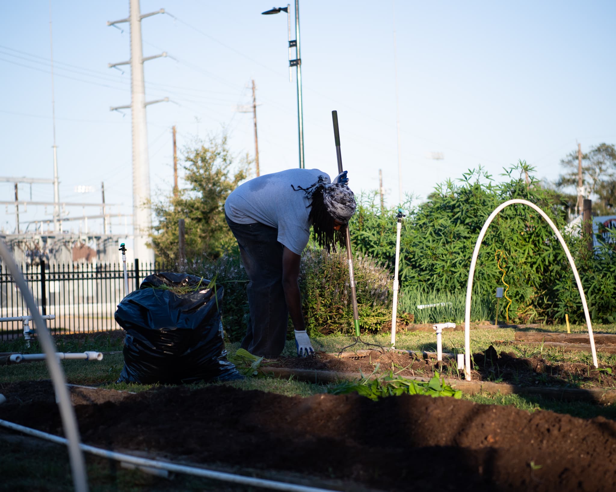 Volunteer working at TSU Community Farm